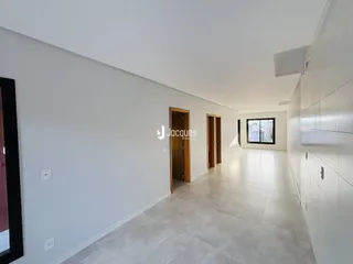 Hall de entrada de um corredor interno de uma residência.