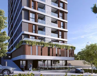 Fachada moderna de um edifício residencial com terraço verde em Lajeado, Brasil.