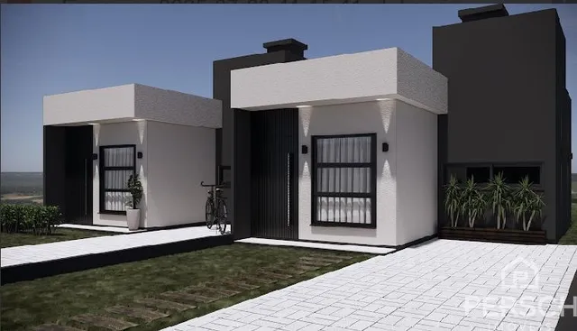 Fachada externa de uma casa moderna em Lajeado, Brasil, com paisagismo frontal.
