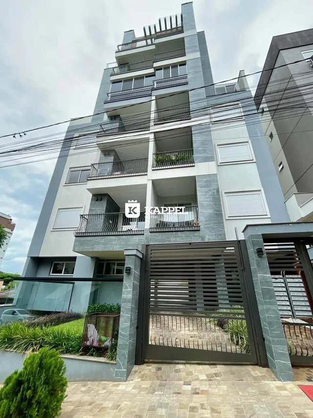 Foto da fachada de um prédio residencial moderno em Lajeado, Brasil.