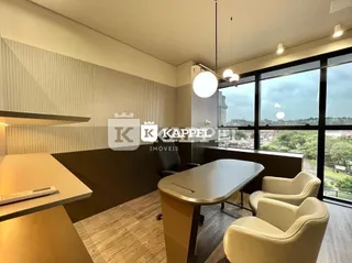 Foto de um ambiente interno com mesa e cadeiras em um apartamento.
