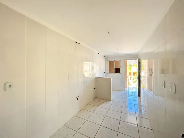 Corredor interno de um imóvel em Lajeado, Brasil.