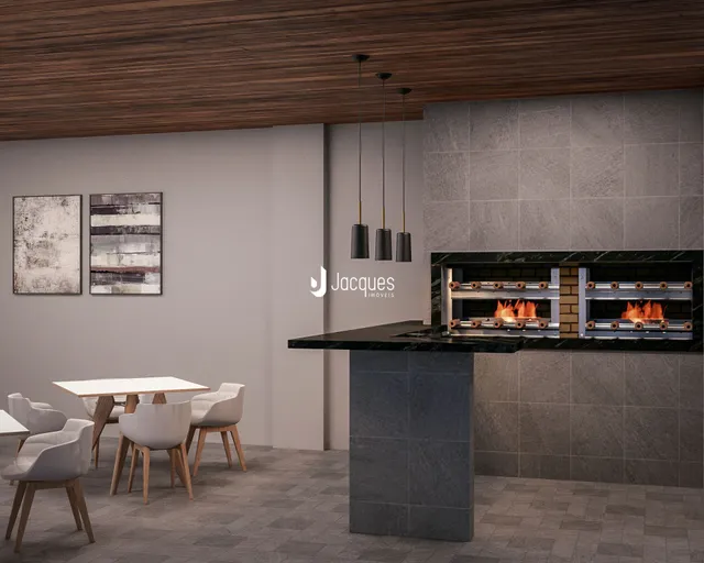Interior de uma sala de estar com lareira e ilha de cozinha moderna.