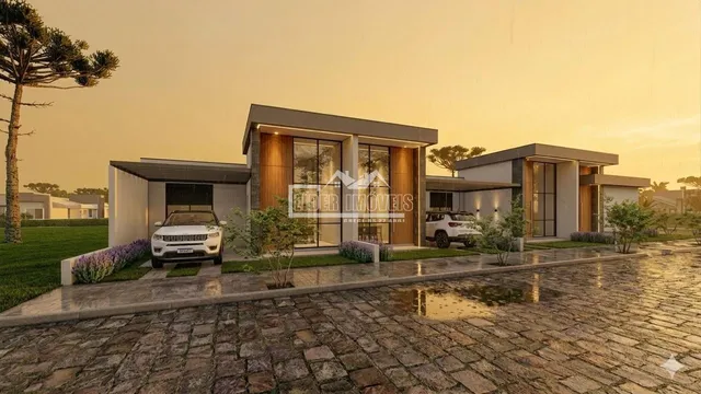 Fachada moderna de uma residência em Lajeado, Brasil, com paisagismo.