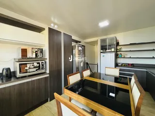 Vista da cozinha e sala de jantar de um imóvel em Lajeado, Brasil.
