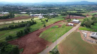 Vista aérea de terras agrícolas e áreas rurais na região de Lajeado.