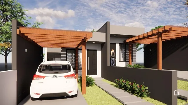 Fachada de uma residência moderna em Lajeado, Brasil, com garagem e paisagismo.