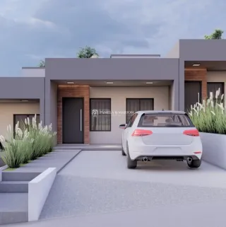 Fachada moderna de uma residência em Lajeado, Brasil, com paisagismo frontal.