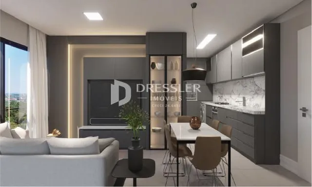 Sala de estar moderna com armários embutidos e cozinha integrada.