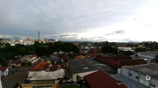 Vista aérea de uma área residencial em Lajeado, Brasil, com várias casas.