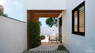 Fachada da casa com vista para o mar.