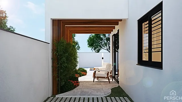 Fachada da casa com vista para o mar.