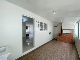 Hall de uma propriedade em Lajeado, Brasil, mostrando o corredor interno.