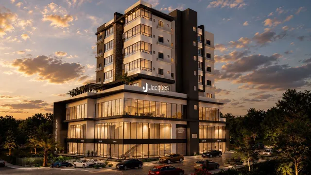 A fachada de um edifício residencial em Lajeado, Brasil, ao pôr do sol.