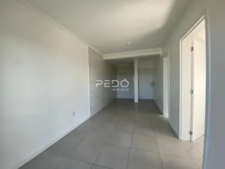 Vista do corredor interno de um imóvel em Lajeado, Brasil.