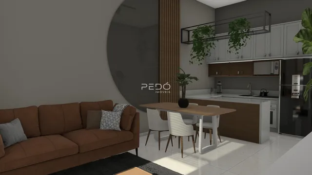 Sala de estar com sofá e mesa de jantar em um apartamento moderno.