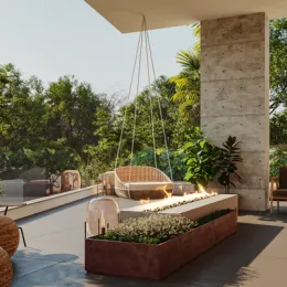 Área externa com um vaso de jardim e cadeira suspensa em um pátio moderno.