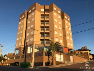 Fachada de um prédio residencial de múltiplos andares em Lajeado, Brasil.