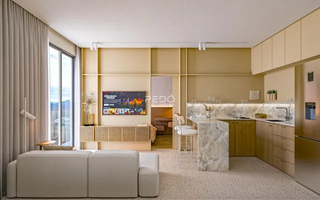 Sala de estar e cozinha de um apartamento moderno em Lajeado.