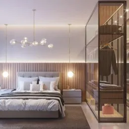 Foto de um quarto com cama e painéis de madeira.