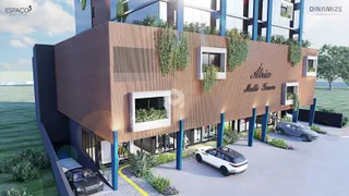 Fachada de um edifício residencial em Lajeado com jardim e estacionamento.