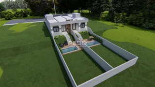 Vista externa de uma residência com piscina e jardim em Lajeado.