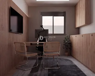 Ambiente interno com mesa de madeira e televisão montada na parede.