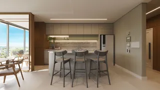 Cozinha moderna com vista para o exterior.
