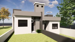 Fachada moderna de uma residência em Lajeado, Brasil, com jardim frontal.