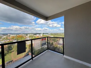 Vista panorâmica da varanda com vista para a paisagem urbana de Lajeado.
