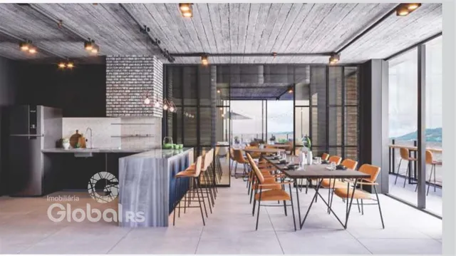 Sala de jantar e cozinha moderna com vista para a paisagem.