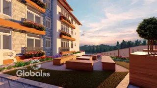 Fachada de um edifício residencial em Lajeado, Brasil, com área externa ajardinada.
