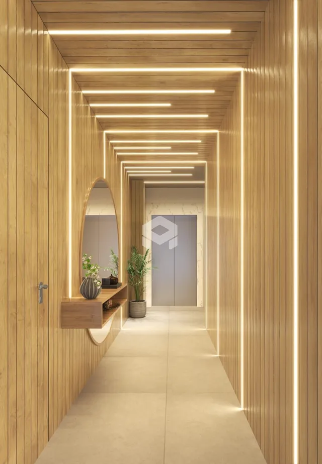 Corredor interno com revestimento de madeira e iluminação linear.