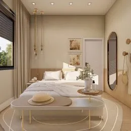 Quarto com cama e cabeceira em um ambiente claro.