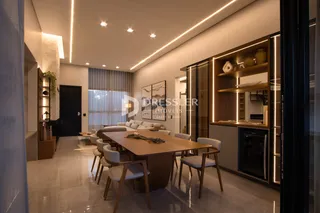 Ambiente moderno com sala de jantar e decoração em um imóvel no Brasil.