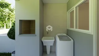 Foto de um banheiro interno com revestimento de parede claro.