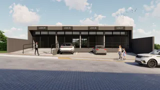 Fachada de um prédio comercial com quatro lojas em Lajeado, Brasil.