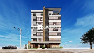 A fachada moderna de um prédio residencial em Lajeado, Brasil, sob um céu azul.
