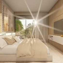 Foto de um quarto com cama grande e janela.
