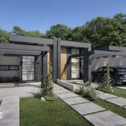 Área externa com piso de concreto e vegetação em um imóvel em Lajeado.