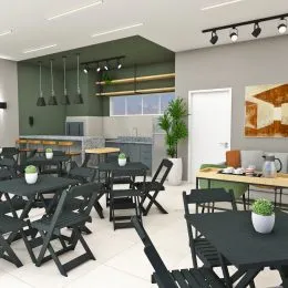 Foto de um ambiente interno com mesa de jantar e armários na cozinha.