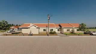 Fachada de uma casa residencial em Lajeado, Brasil, com telhado de telhas vermelhas.