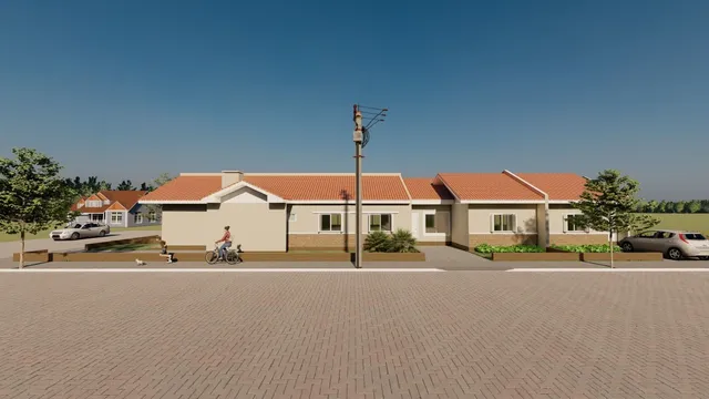 Fachada de uma casa residencial em Lajeado, Brasil, com telhado de telhas vermelhas.
