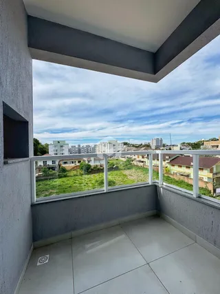 Vista da varanda de um imóvel em Lajeado, Brasil, com vista para uma área verde.