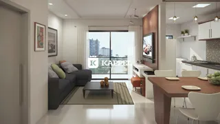 Sala de estar moderna com sofá e vista para a paisagem urbana.
