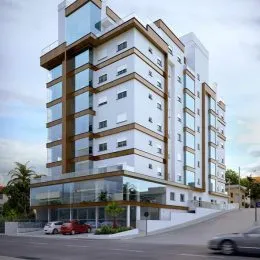 Fachada moderna de um prédio residencial com grandes janelas de vidro em Lajeado.