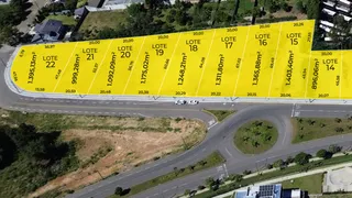 Vista aérea de um loteamento em Lajeado, Brasil, mostrando os lotes numerados.