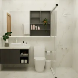 Um banheiro moderno com pia e vaso sanitário brancos.