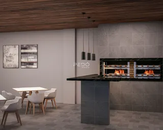 Ambiente moderno com cozinha e sala de jantar em um imóvel.