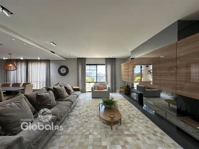 Sala de estar moderna com piso de cerâmica e decoração contemporânea.